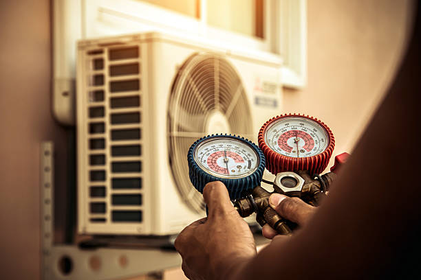 Professional Air Conditioning Service technician working in Old Bridge, NJ